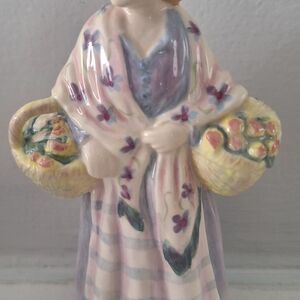 Floral Ceramic Figurine with Baskets